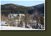 Obec Krásná v zimě z Borové hory